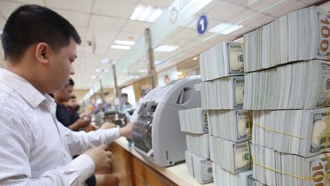 Vì sao Ngân hàng Nhà nước nâng giá mua USD ngay ngày giao dịch đầu năm 2019?