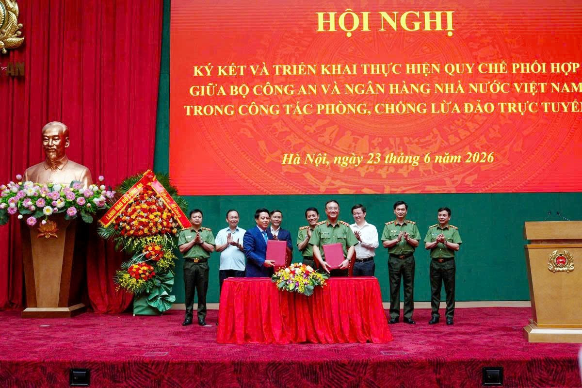 23.6-4-ngan-hang-nha-nuoc-va-bo-cong-an-ky-ket-va-trien-khai-ke-hoach-thuc-hien-quy-che-phoi-hop-trong-cong-tac-phong-chong-lua-dao-truc-tuyen.jpg