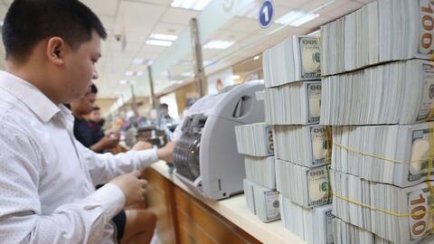 Vì sao Ngân hàng Nhà nước nâng giá mua USD ngay ngày giao dịch đầu năm 2019?