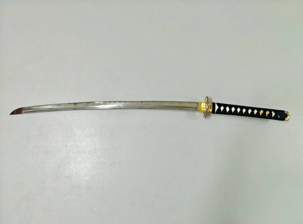 Cây kiếm do Phong sử dụng để chém anh họ, giải quyết mâu thuẫn giúp bố. Ảnh: Công an