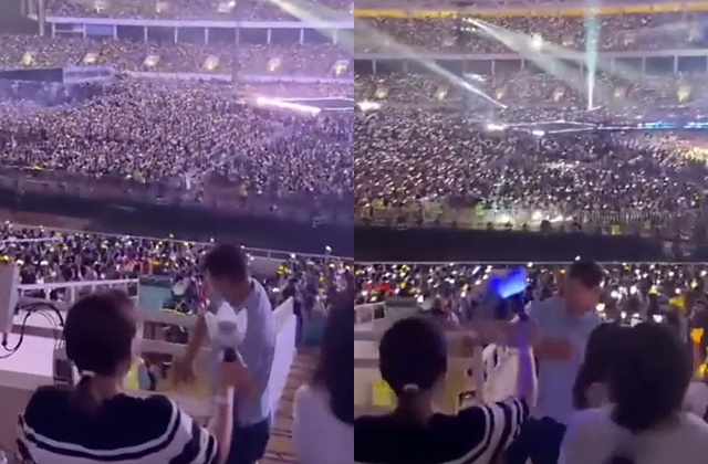Thầy Kim Sang-sik (mặc áo xanh) nhảy cực sung tại concert BigBang tại Mỹ Đình. (Ảnh cắt từ video)
